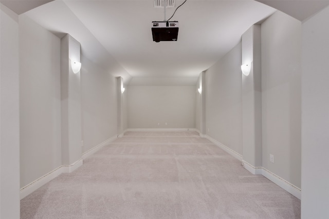 corridor with light colored carpet