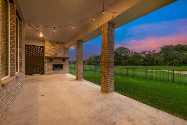 patio terrace at dusk with a lawn