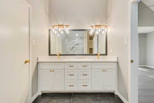 bathroom featuring vanity and wood-type flooring