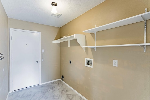 laundry room with washer hookup, a textured ceiling, and hookup for an electric dryer