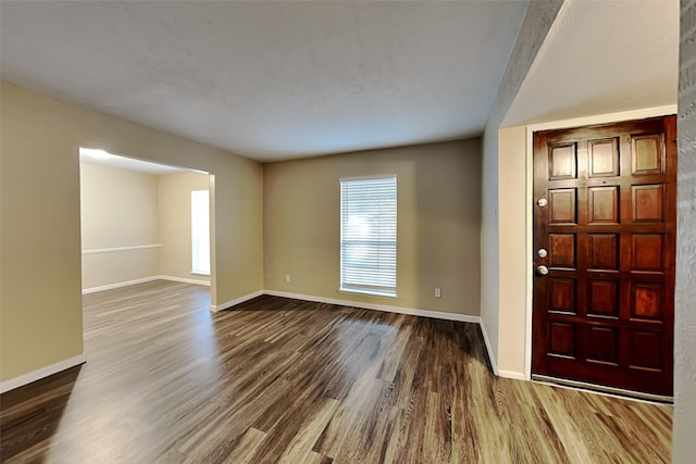 foyer entrance with hardwood / wood-style floors