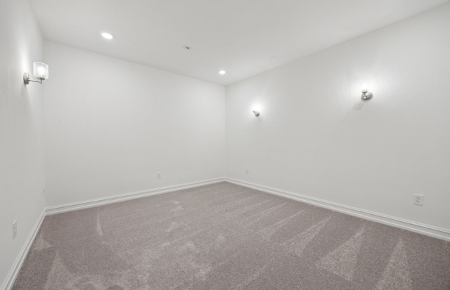 playroom with ceiling fan and carpet