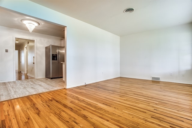 empty room featuring light hardwood / wood-style flooring