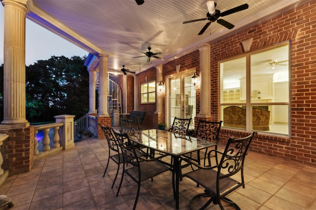 view of patio featuring ceiling fan