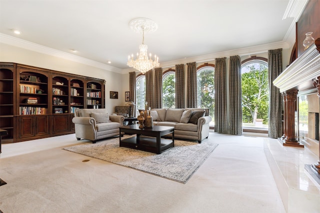 carpeted living room with plenty of natural light, an inviting chandelier, and ornamental molding