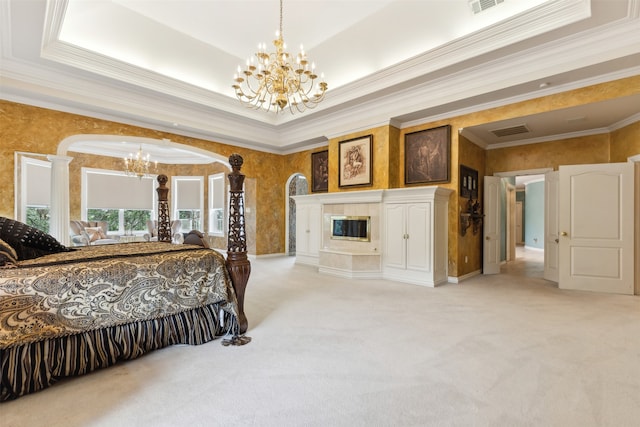 carpeted bedroom featuring crown molding, a raised ceiling, and an inviting chandelier