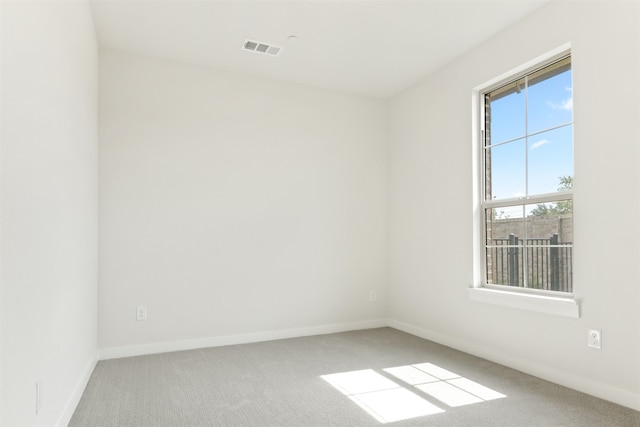 spare room with carpet flooring