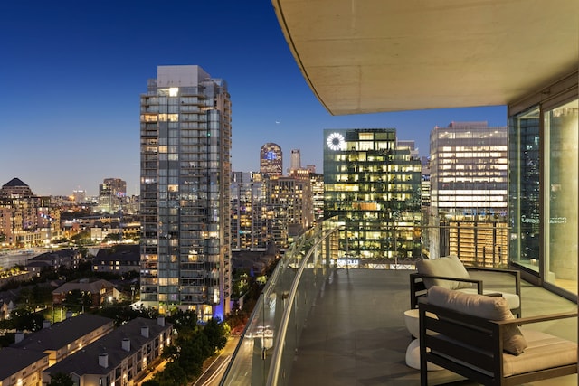 view of balcony at dusk