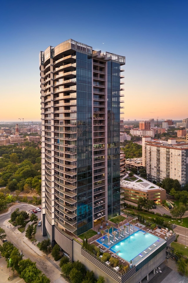 view of outdoor building at dusk