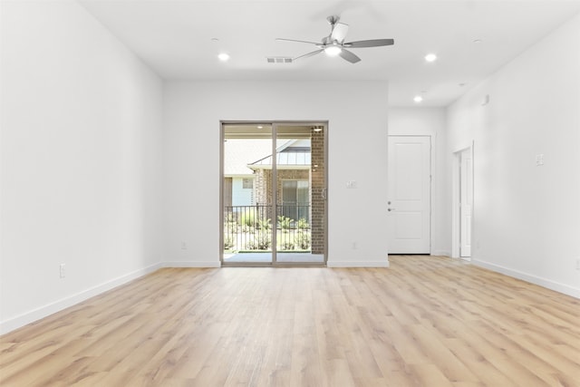 unfurnished room featuring light hardwood / wood-style floors and ceiling fan