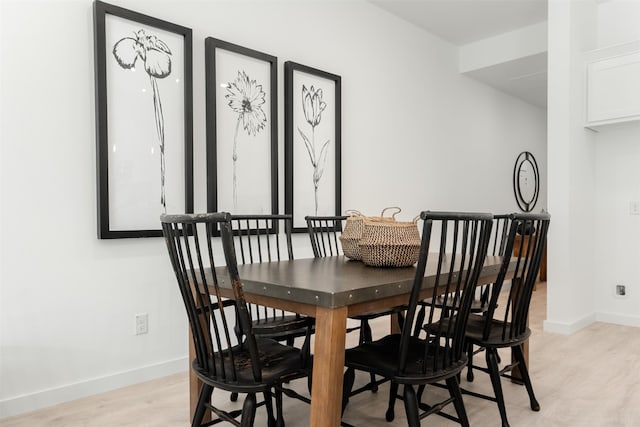 dining room featuring light wood-type flooring