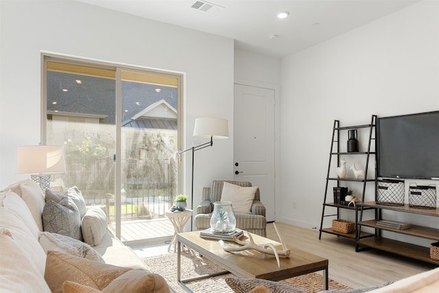 living room with light wood-type flooring