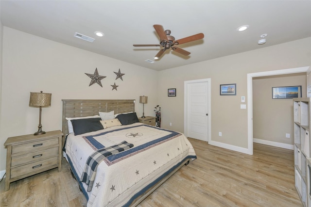 bedroom featuring ceiling fan and light wood-type flooring