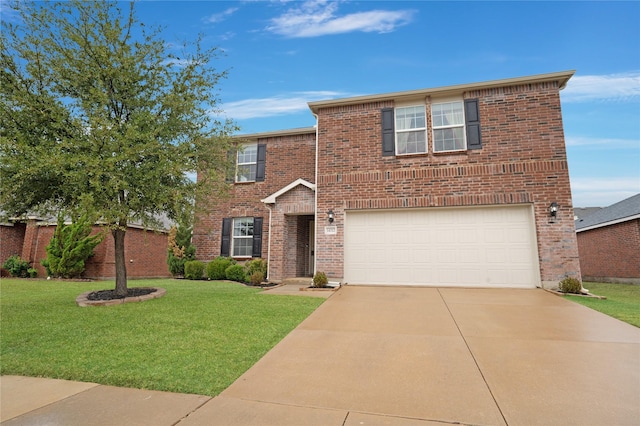 front of property featuring a front lawn and a garage