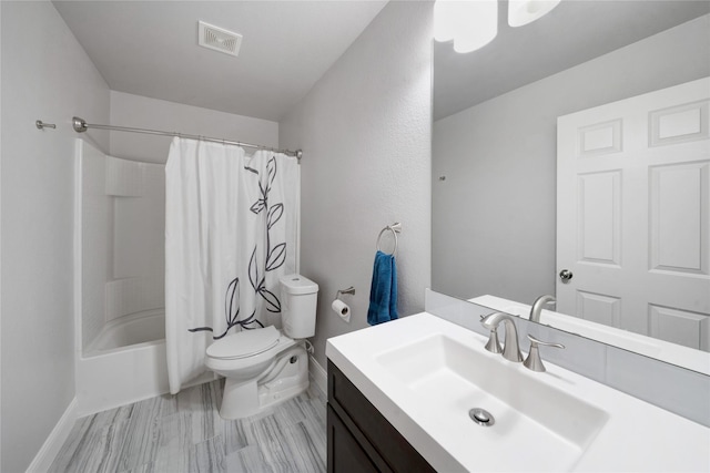 full bathroom with vanity, shower / bathtub combination with curtain, and toilet