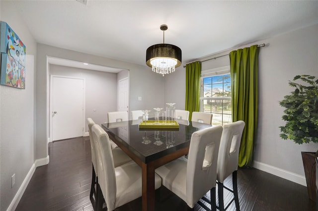 dining space with dark wood-type flooring