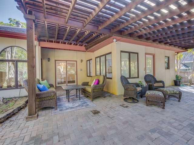 view of patio with an outdoor living space and a pergola