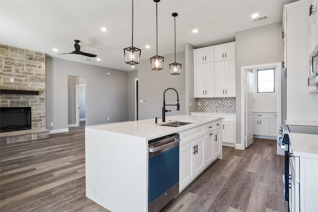 kitchen featuring white cabinets, sink, and stainless steel appliances