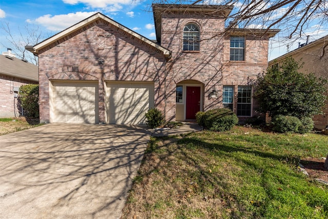 view of front of property with a garage and a front yard