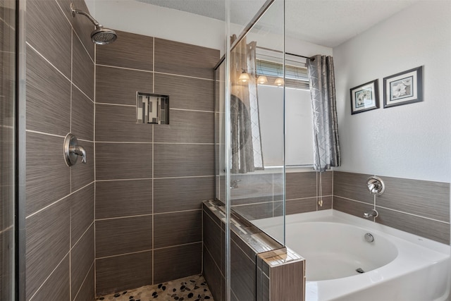 bathroom with a textured ceiling and plus walk in shower