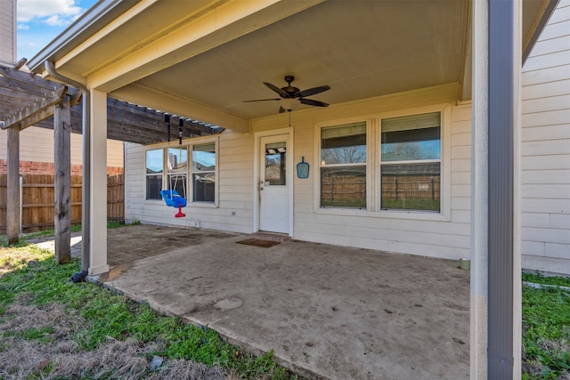 view of patio featuring ceiling fan and a pergola