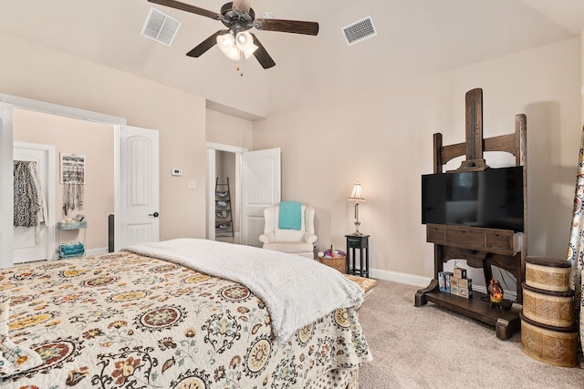 bedroom featuring light colored carpet and ceiling fan