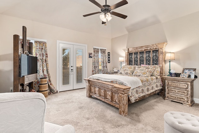 bedroom featuring french doors, light colored carpet, access to outside, vaulted ceiling, and ceiling fan