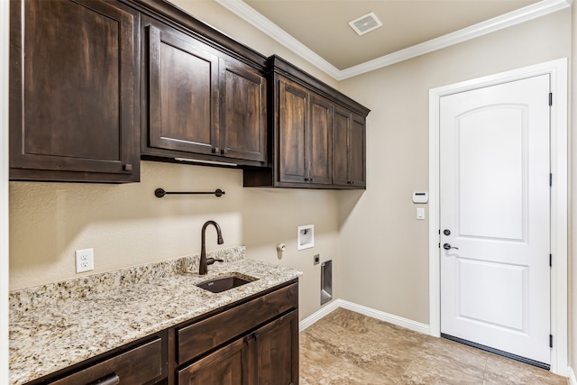 laundry room with cabinets, sink, electric dryer hookup, crown molding, and hookup for a washing machine