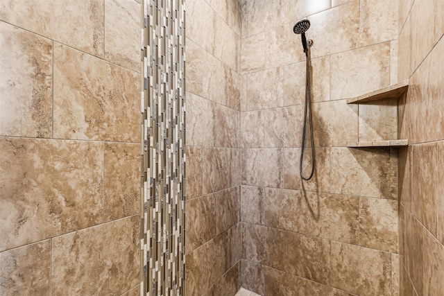 details featuring a tile shower