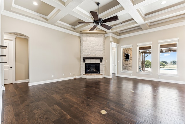 unfurnished living room featuring dark hardwood / wood-style floors, crown molding, and coffered ceiling