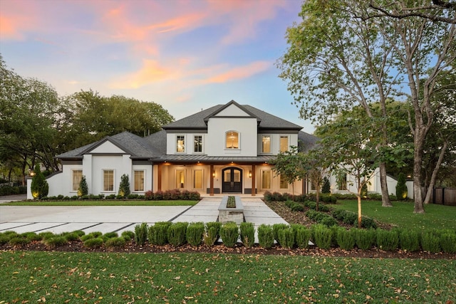 view of front of home with a lawn