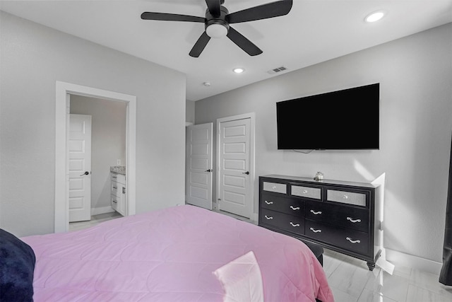 1055 Encino Ct, Wills Point, TX 75169 - bedroom with baseboards, recessed lighting, connected bathroom, and a ceiling fan
