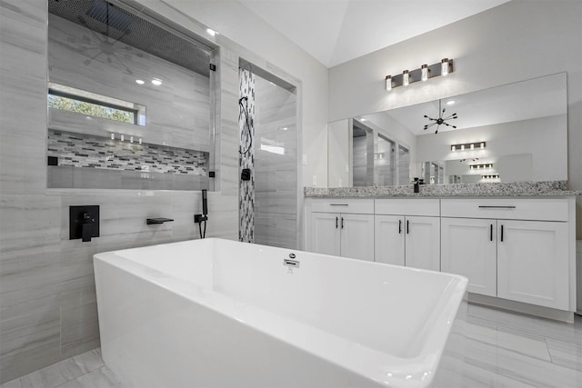 1055 Encino Ct, Wills Point, TX 75169 - full bath featuring a freestanding bath, vanity, tiled shower, and marble finish flooring