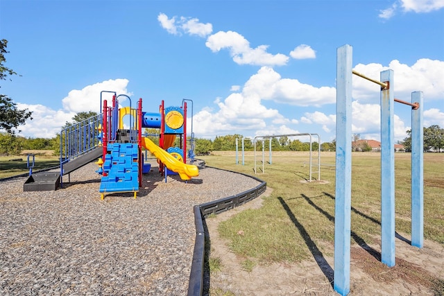 view of playground with a yard