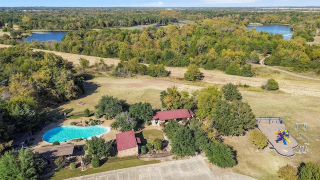 1055 Encino Ct, Wills Point, TX 75169 - aerial view of property's location featuring a heavily wooded area, a large body of water, and a pool area