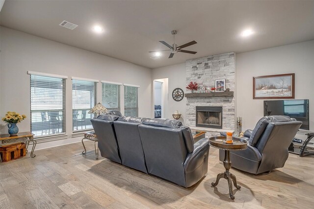 kitchen with a center island with sink, sink, white cabinetry, appliances with stainless steel finishes, and lofted ceiling