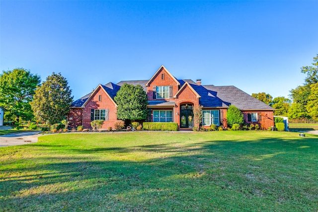 view of front of house with a front lawn