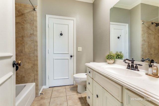 full bathroom with toilet, crown molding, tiled shower / bath, vanity, and tile patterned flooring