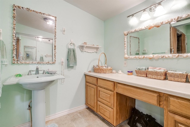 bathroom featuring tile patterned floors and sink