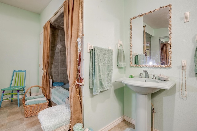 bathroom featuring tile patterned flooring