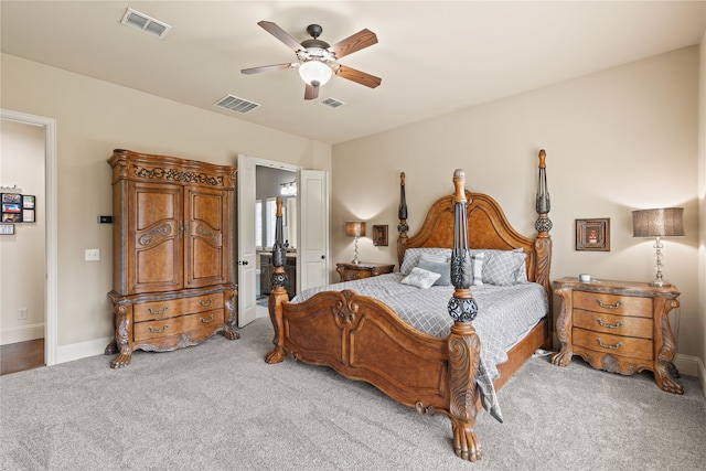 bedroom with light carpet and ceiling fan