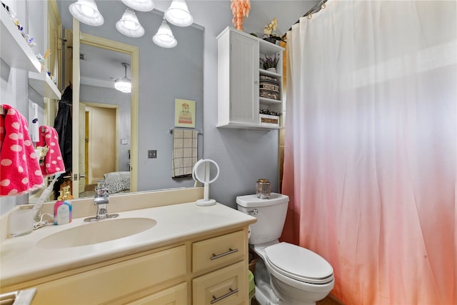 bathroom with vanity and toilet