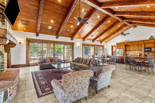 tiled living room with high vaulted ceiling, wood ceiling, and ceiling fan