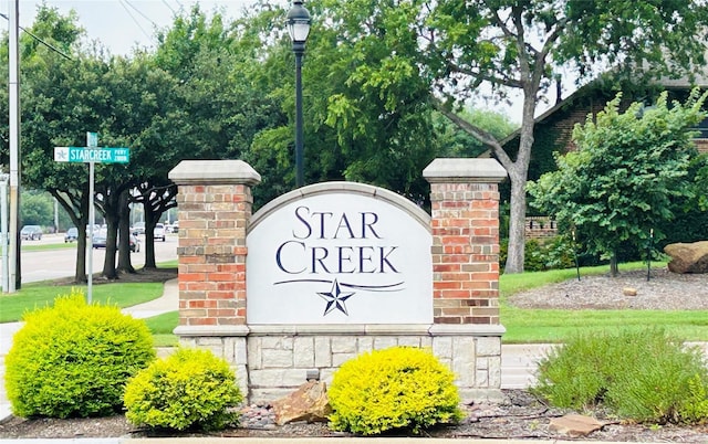 view of community sign