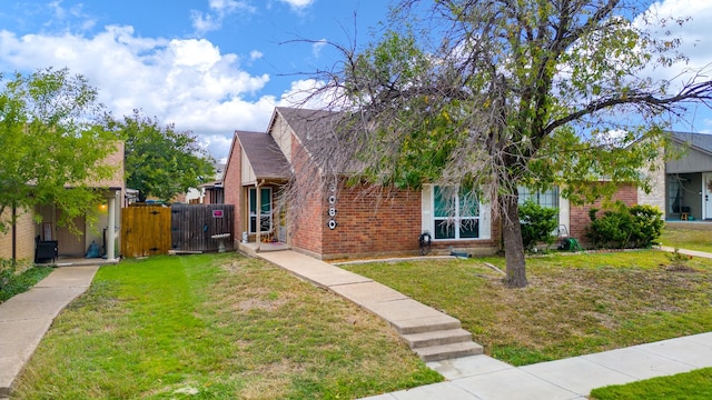 view of front of house with a front lawn