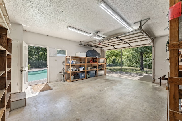1901 Shady Hollow Ct, Garland, TX 75040 - garage featuring an outdoor pool
