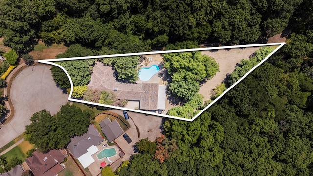 1901 Shady Hollow Ct, Garland, TX 75040 - aerial overview of property's location with a pool area and property parcel outlined