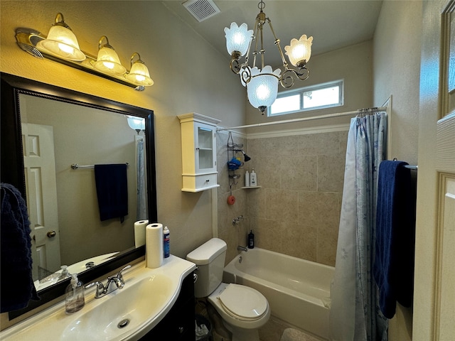 full bathroom featuring toilet, vanity, shower / bath combo with shower curtain, and a chandelier