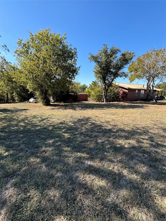 145 Timberline Dr, Whitney, TX 76692 - view of grassy yard