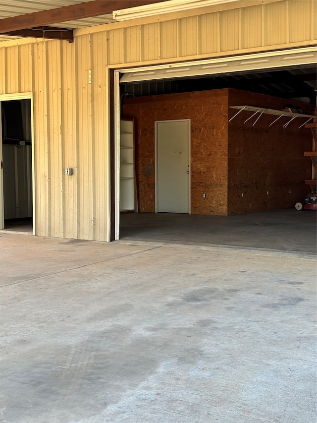 garage with wood walls